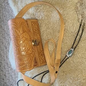 Leather purse with cowhide.